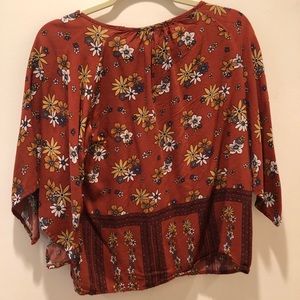 beautiful warm colored blouse with flowy arms
